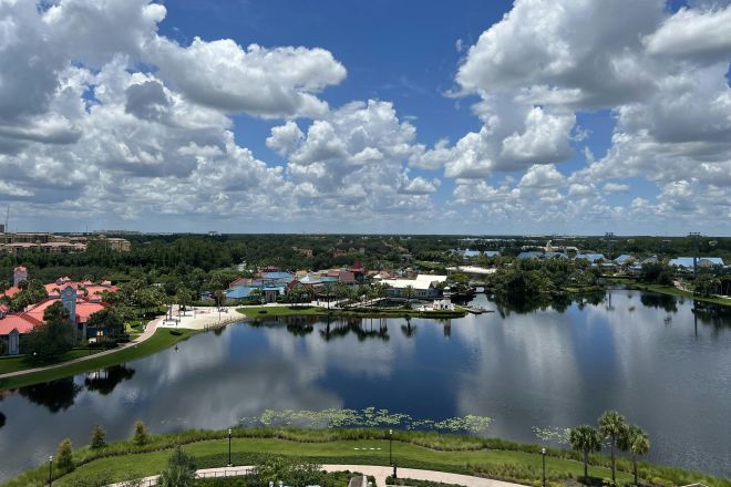 Aerial view of a scenic resort in Lake Buena Vista, Florida, with waterfront and lush landscape.